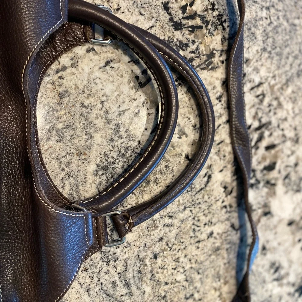 Roots Brown Leather hand Bag or crossbody bag